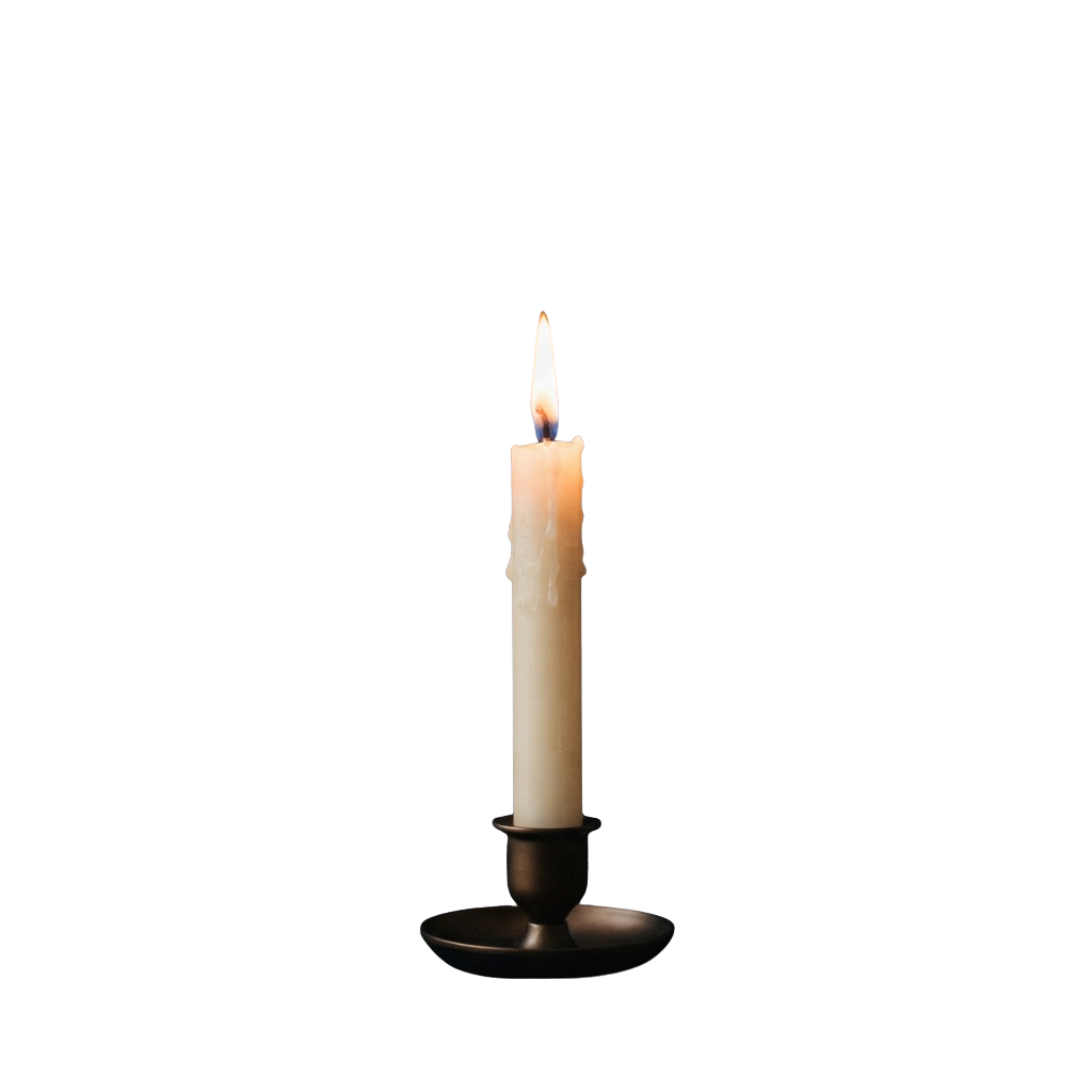 A single white candle with a lit wick placed on a black holder against a dark background