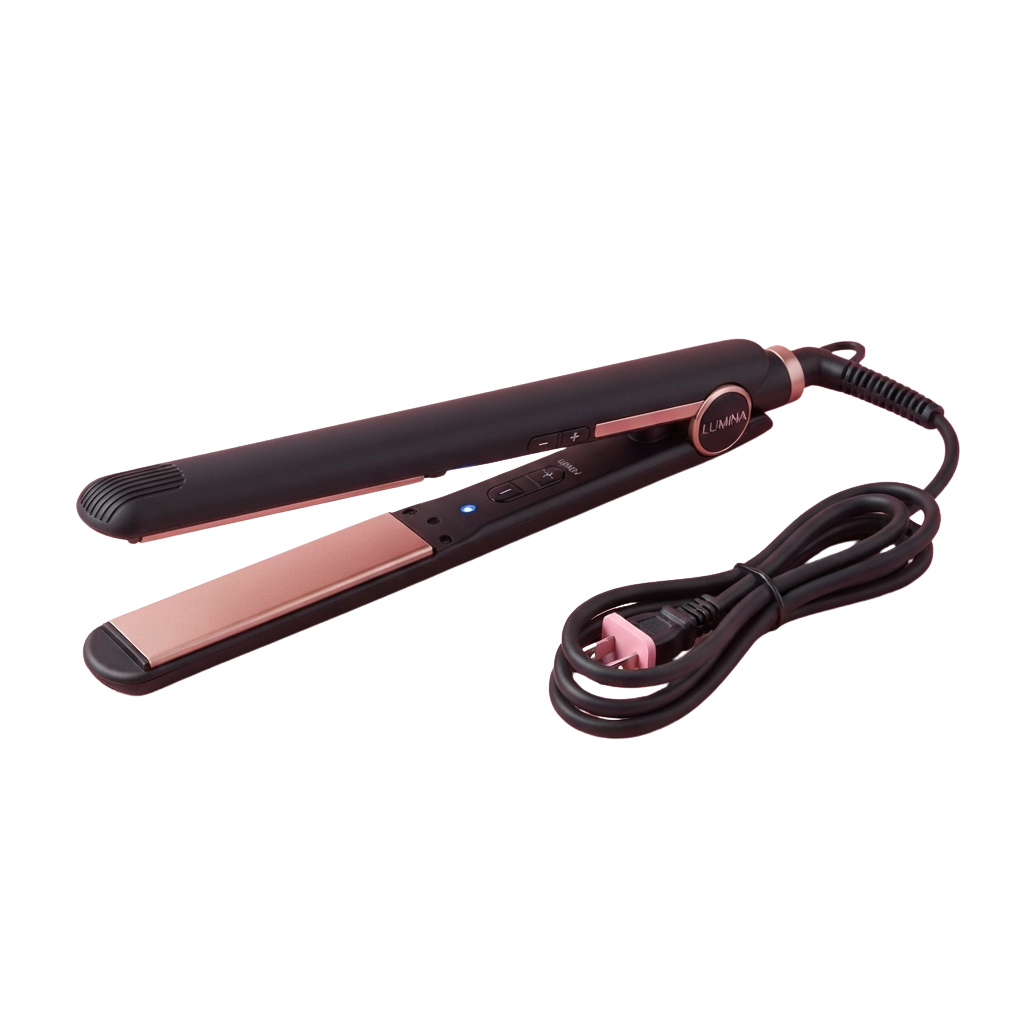 A sleek black and pink ceramic flat iron for straightening hair with a coiled cord.
