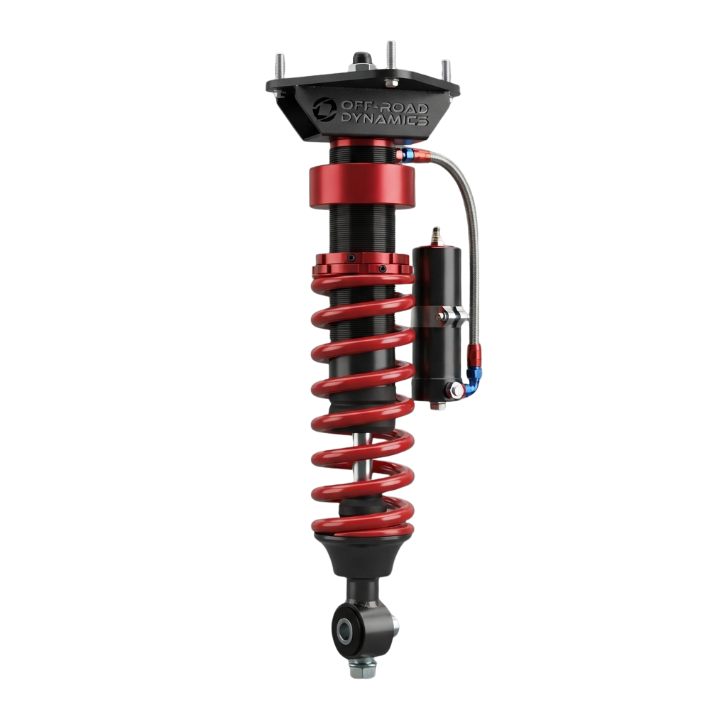 Coilover shock absorber with red springs and black damper for off-road vehicles