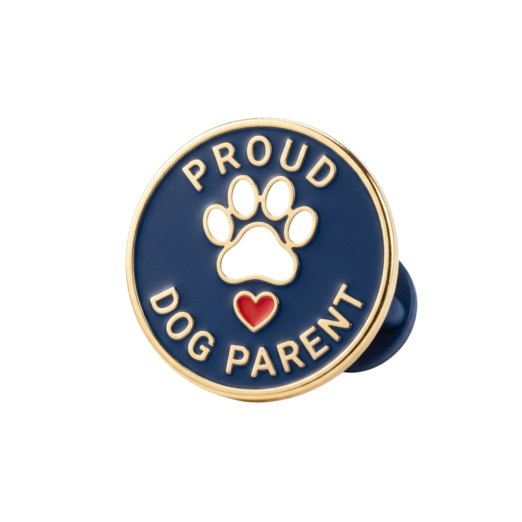 Round enamel pin featuring a paw print, heart, and text reading Proud Dog Parent