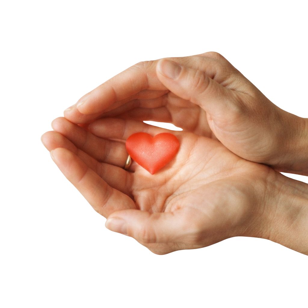 Two hands gently holding a small red heart-shaped object