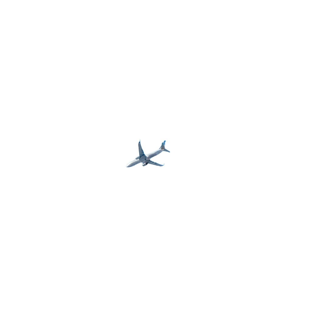 A commercial airplane flying in the night sky with illuminated wings and engines