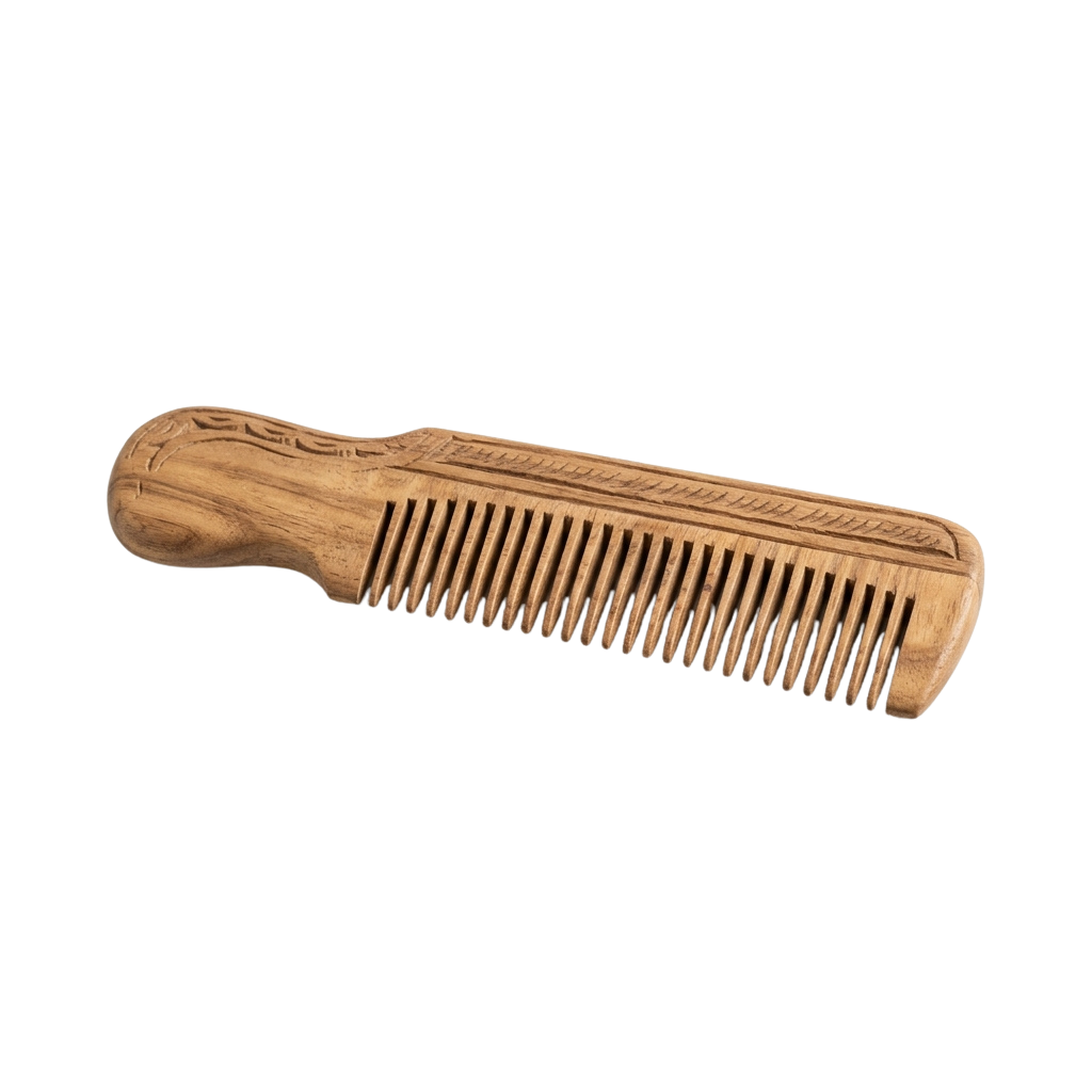A light brown wooden comb with detailed carvings on the handle and teeth for detangling hair