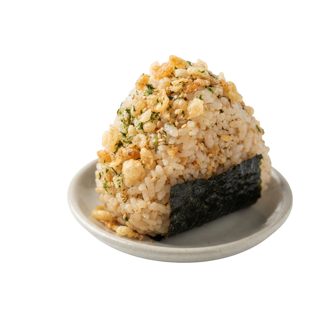 A triangular onigiri rice ball topped with sesame seeds and green herbs, wrapped partially in black nori seaweed on a white plate