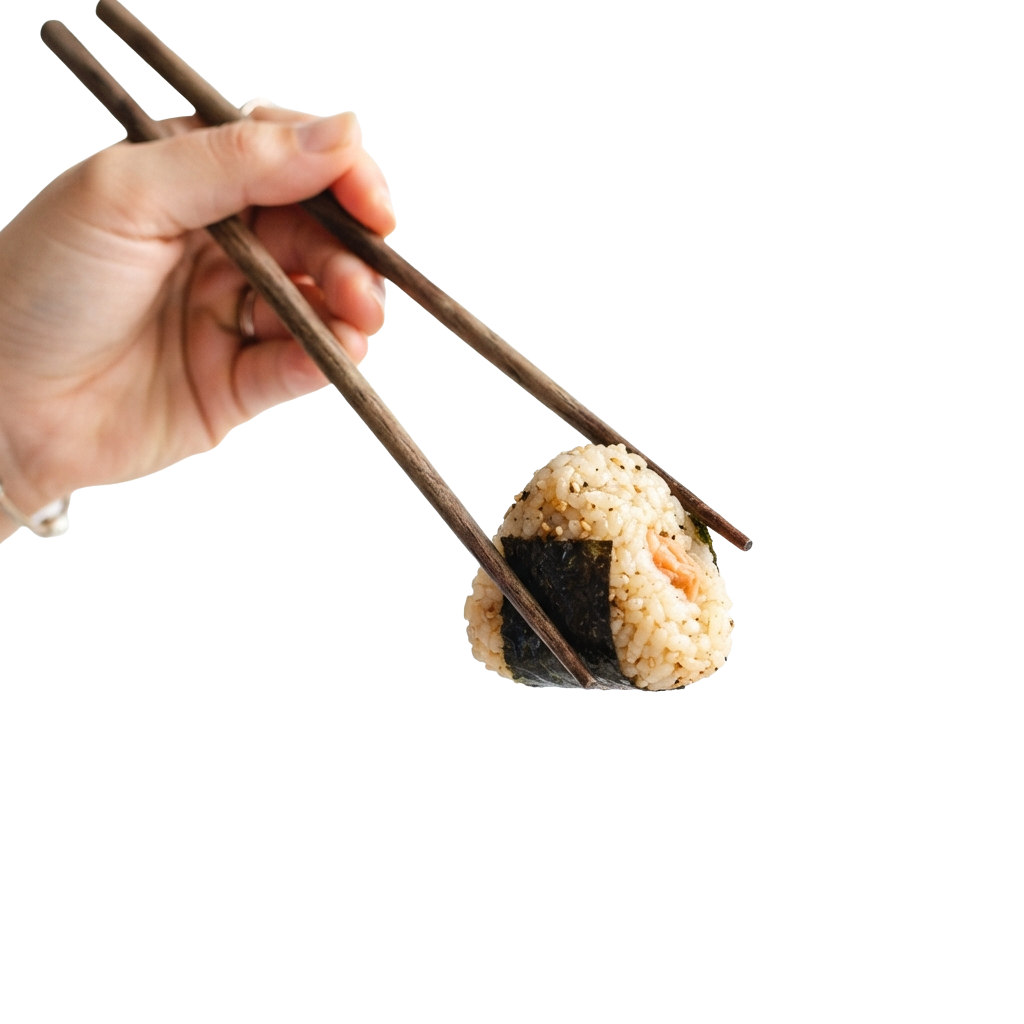 A hand holding a triangular onigiri rice ball with seaweed on chopsticks