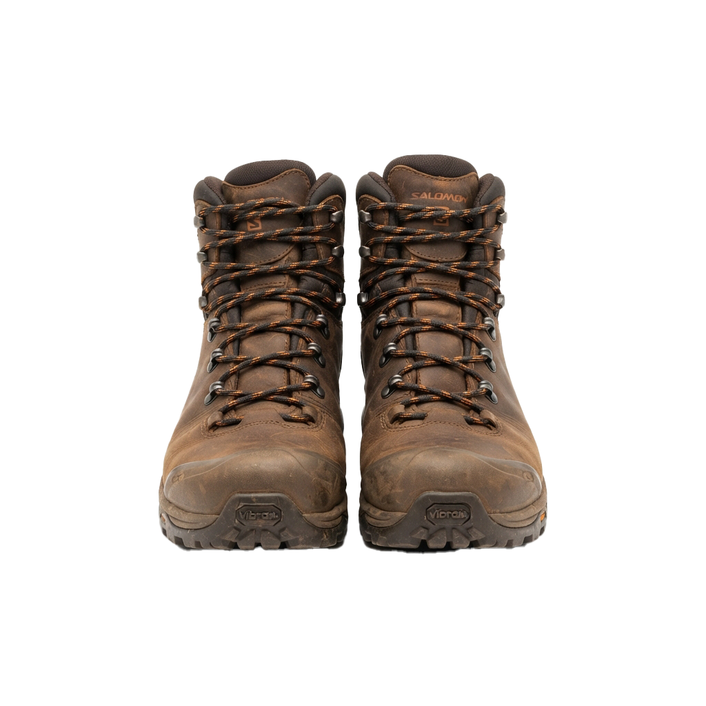 Pair of brown hiking boots with laces and Vibram soles shown from behind