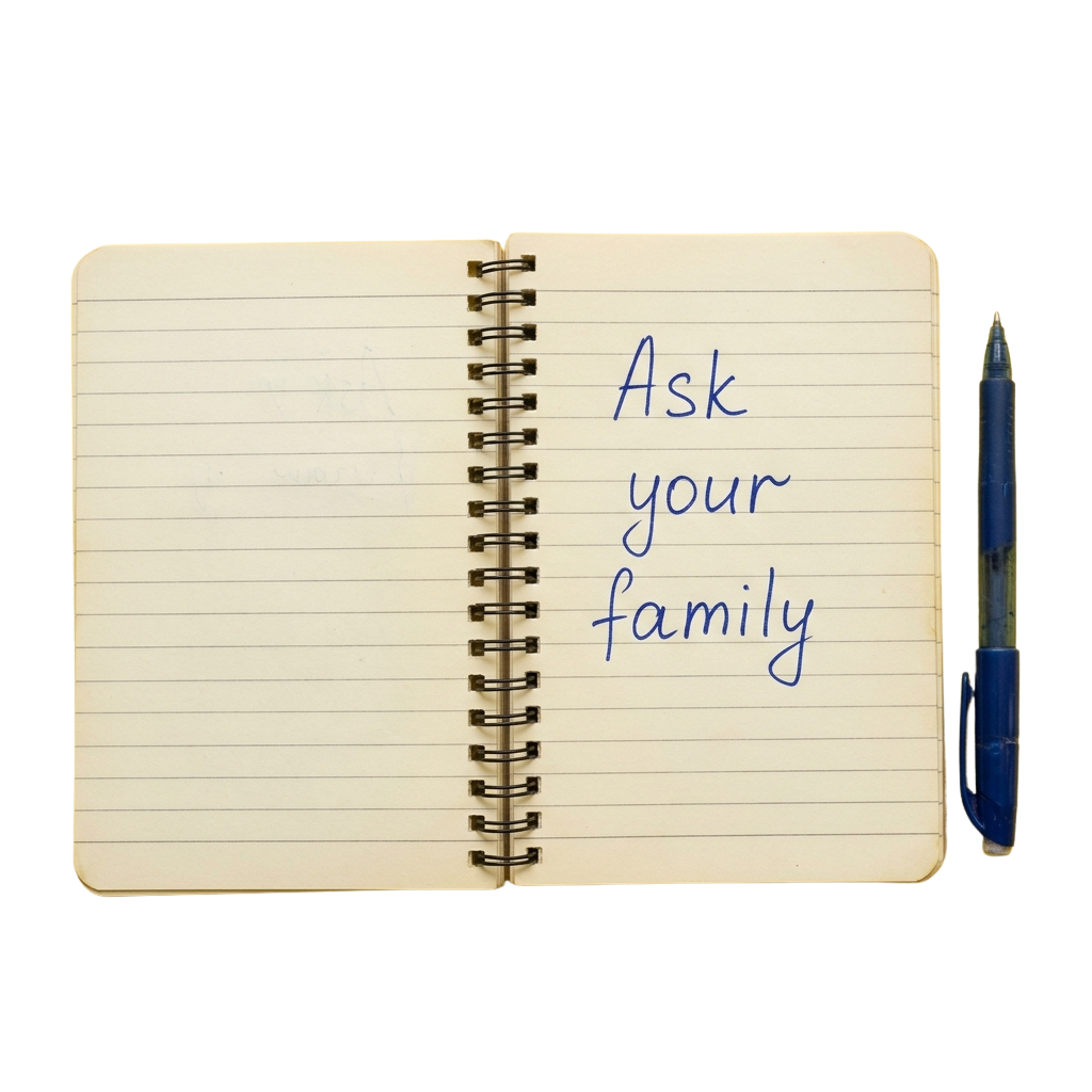 Open notebook with handwritten text saying Ask your family and a blue pen resting on the page