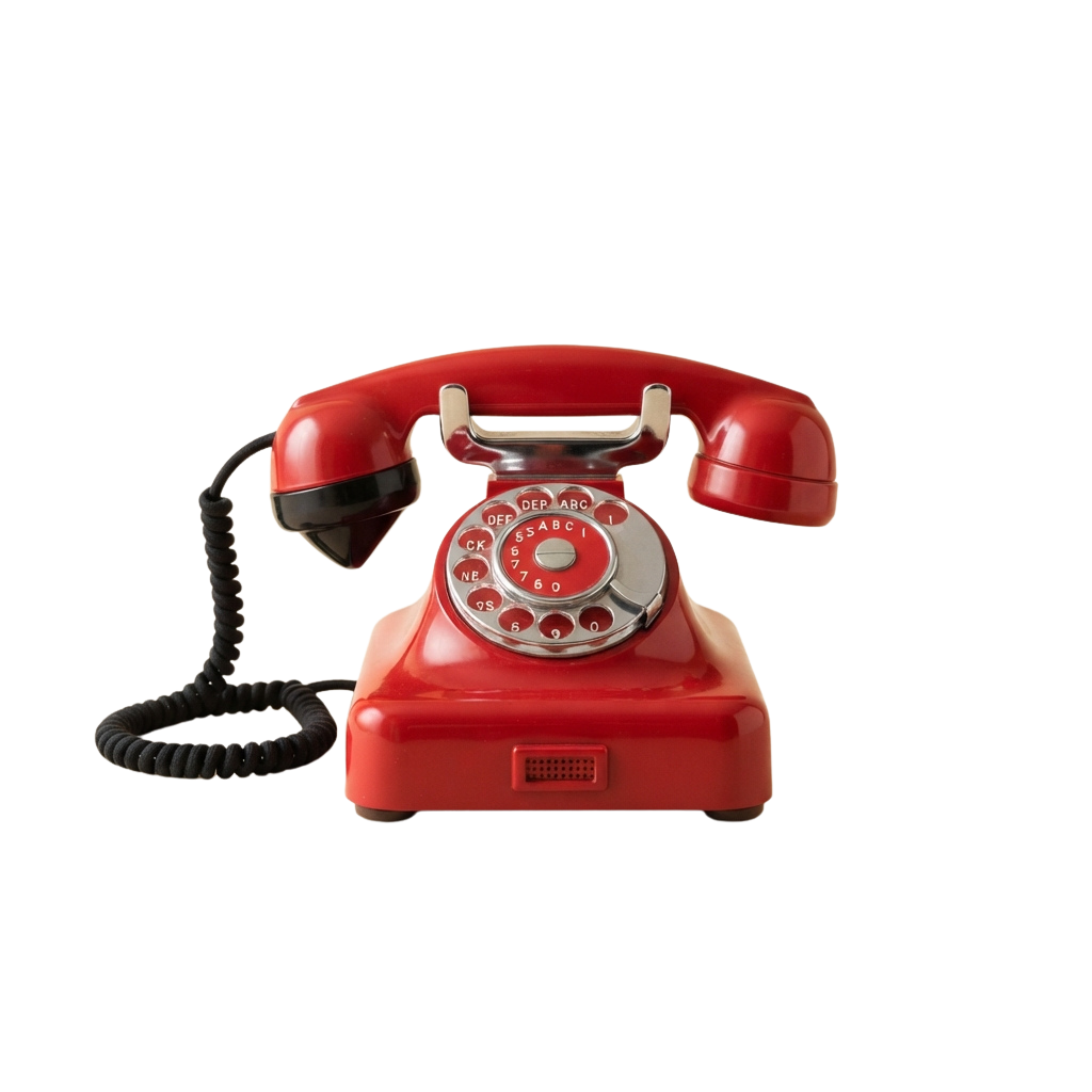 A red rotary telephone with a black coiled cord and numbered dial