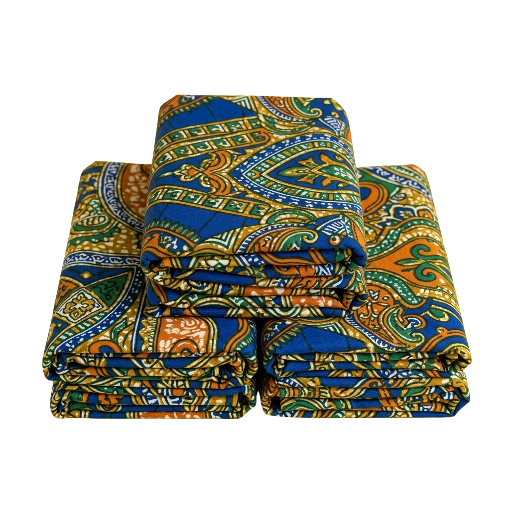 Stack of folded fabric with intricate blue, orange, green, and gold African print patterns