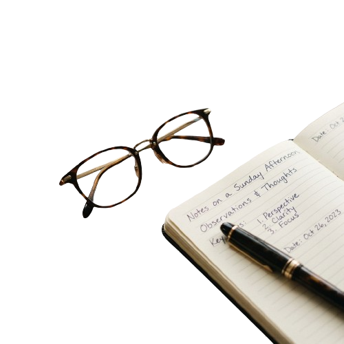 A pair of round glasses resting on an open notebook with handwritten notes and a pen beside it on a dark background