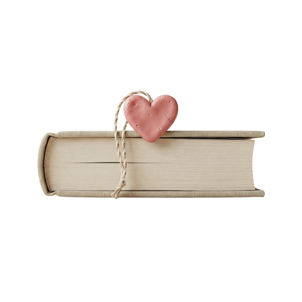 A closed book with a pink heart attached by twine on its spine against a black background