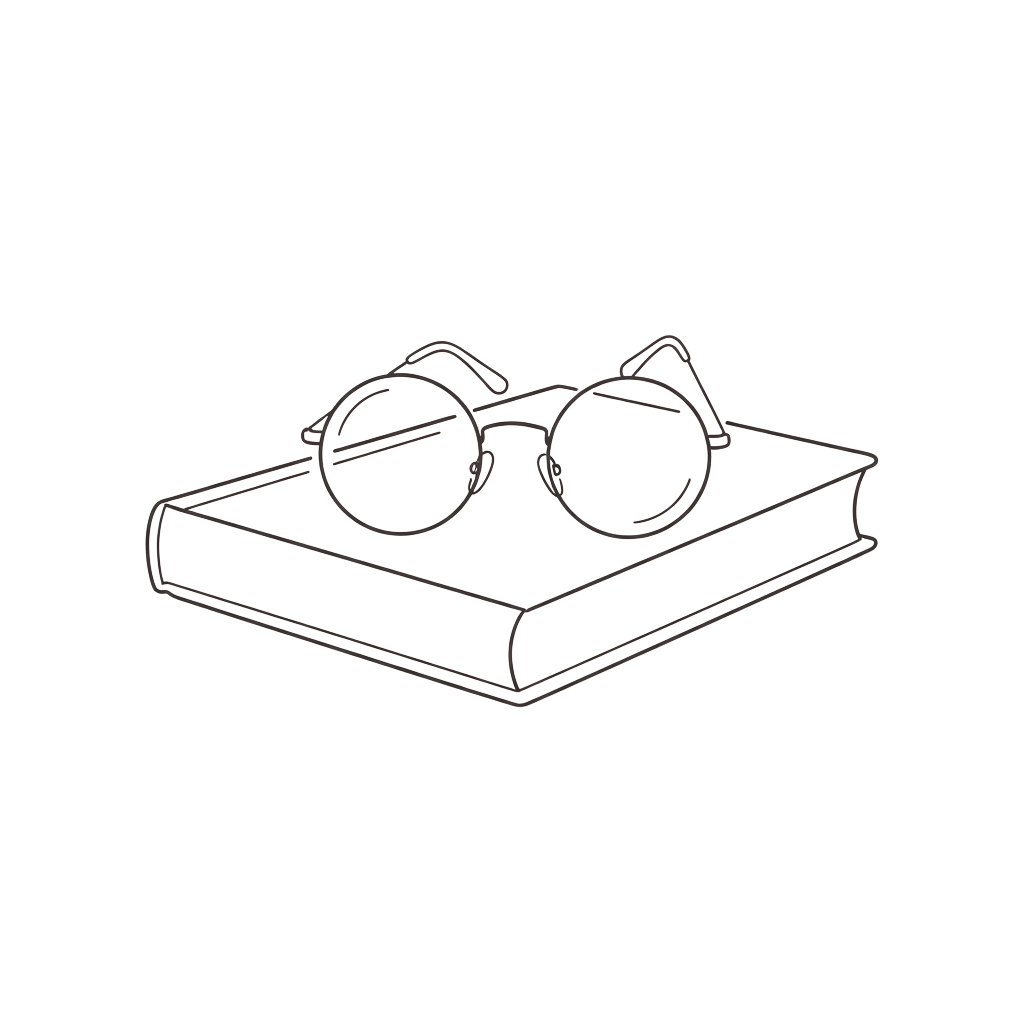 A pair of round-framed glasses placed on top of a closed book.