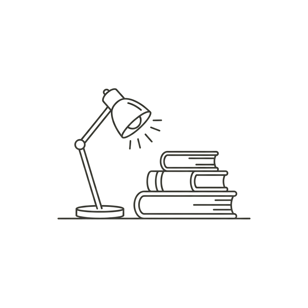 A desk lamp shining light next to a stack of three books