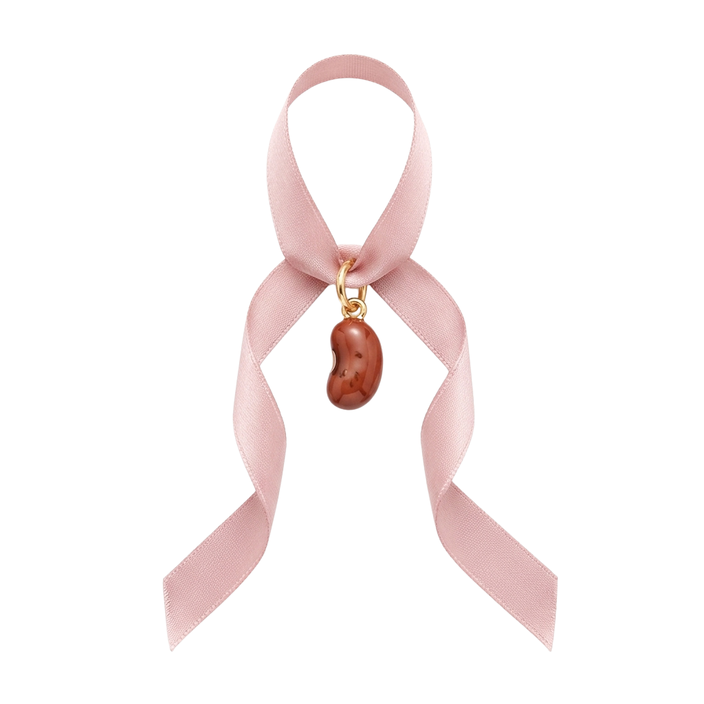 Pink ribbon bracelet with a small brown baby shoe charm attached