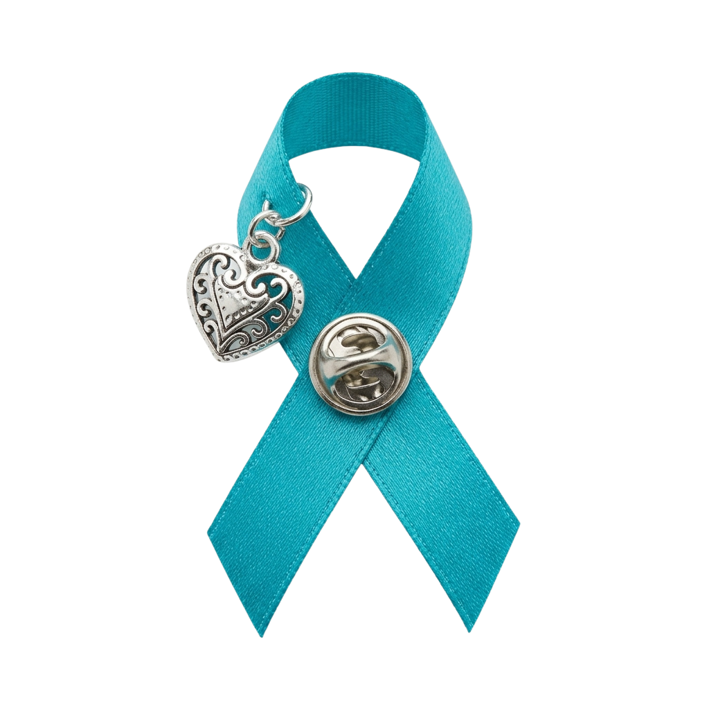 A turquoise awareness ribbon pinned with a decorative heart charm and a bell charm on a black background