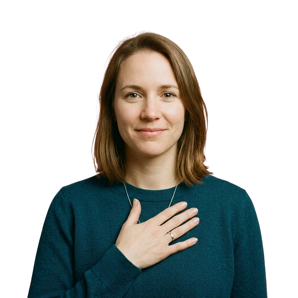 A woman with shoulder-length brown hair wearing a teal sweater gestures with her hand over her heart.