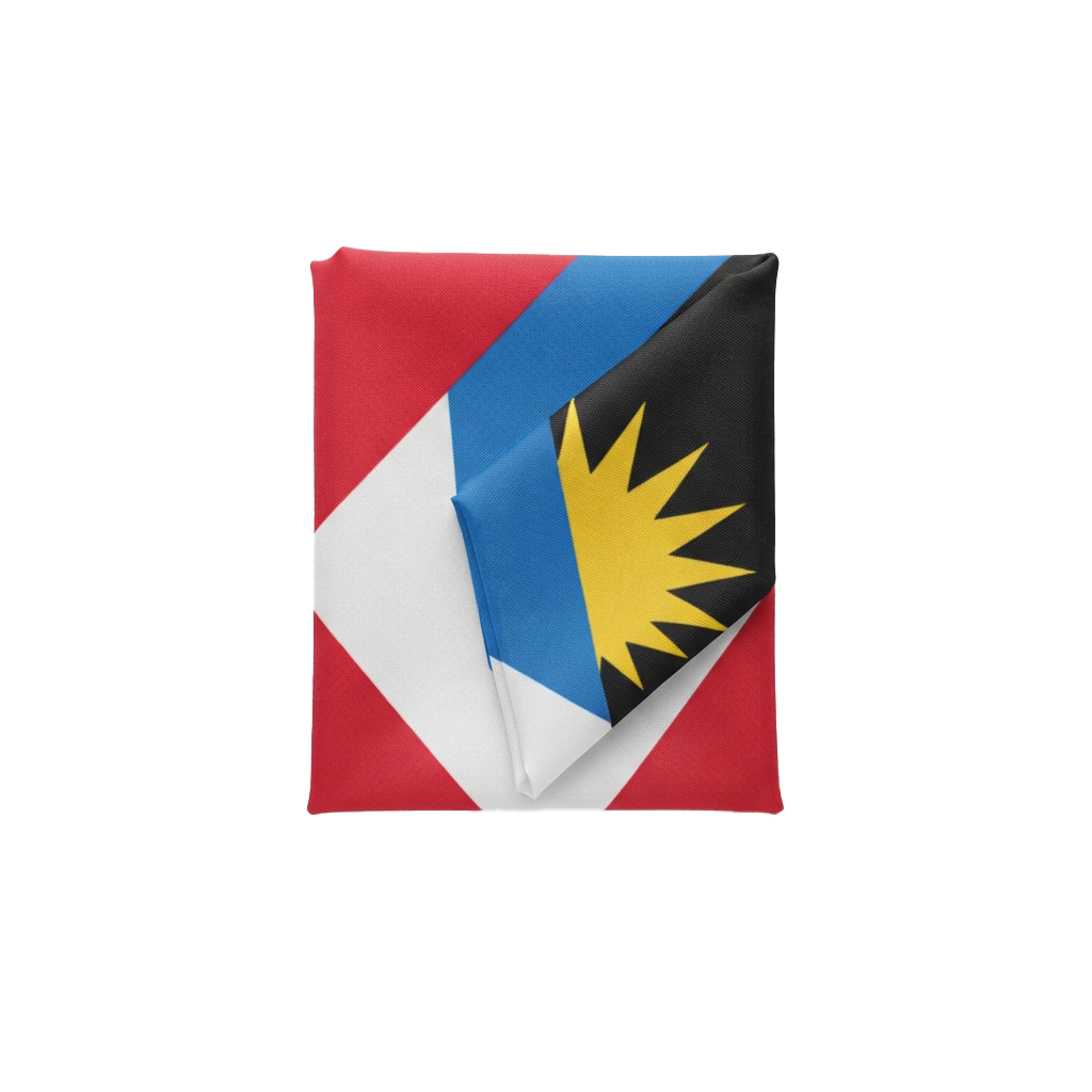 Two national flags overlapping: Antigua and Barbuda on top with red, white, blue stripes and a sunburst, and France beneath with blue, white, red vertical stripes
