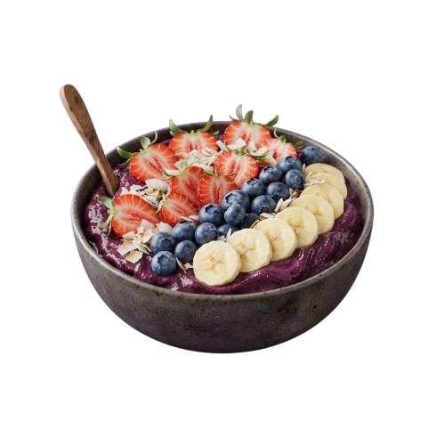 A dark purple acai bowl topped with sliced strawberries, blueberries, banana, and granola in a gray bowl with a wooden spoon