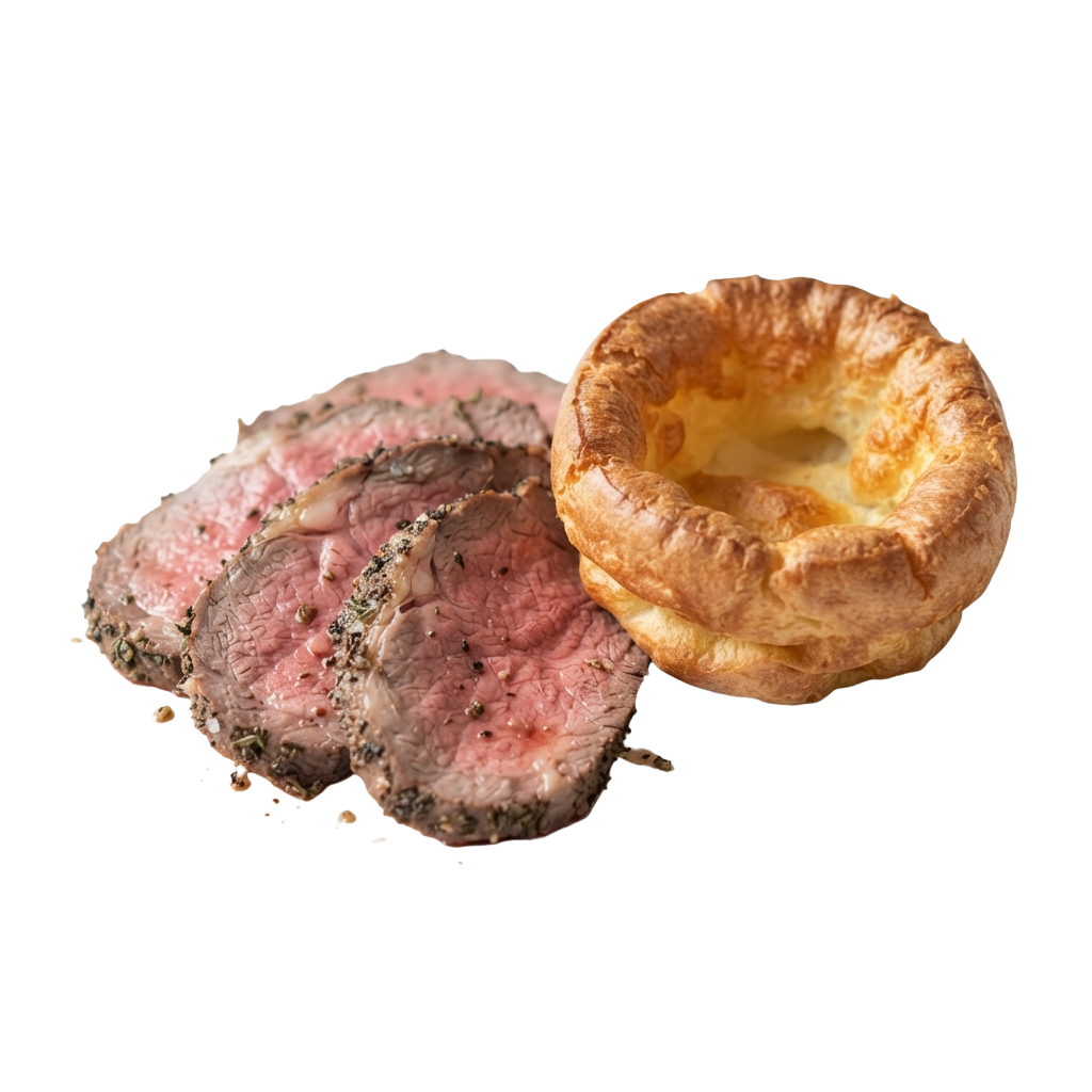 Slices of pink roast beef with a golden Yorkshire pudding