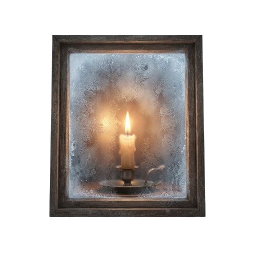 A lit candle behind a frosted glass window pane with ice-like texture