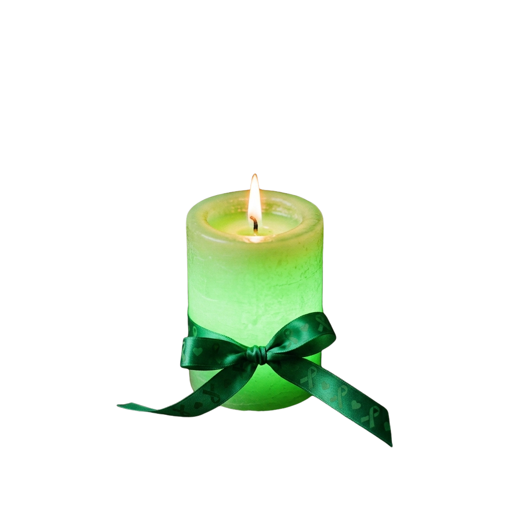 A lit green candle tied with a green ribbon featuring a white ribbon symbol.