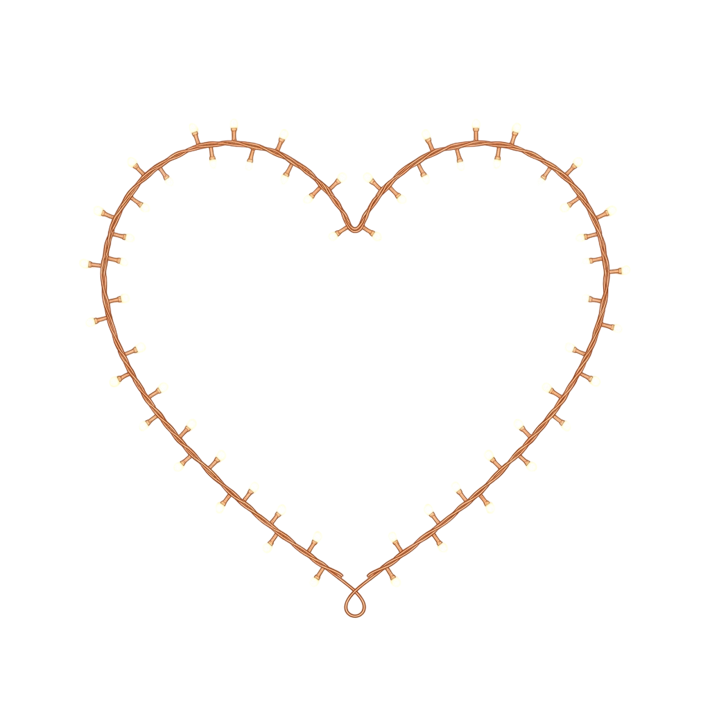 A heart-shaped wire frame adorned with evenly spaced white beads forming a decorative pattern.