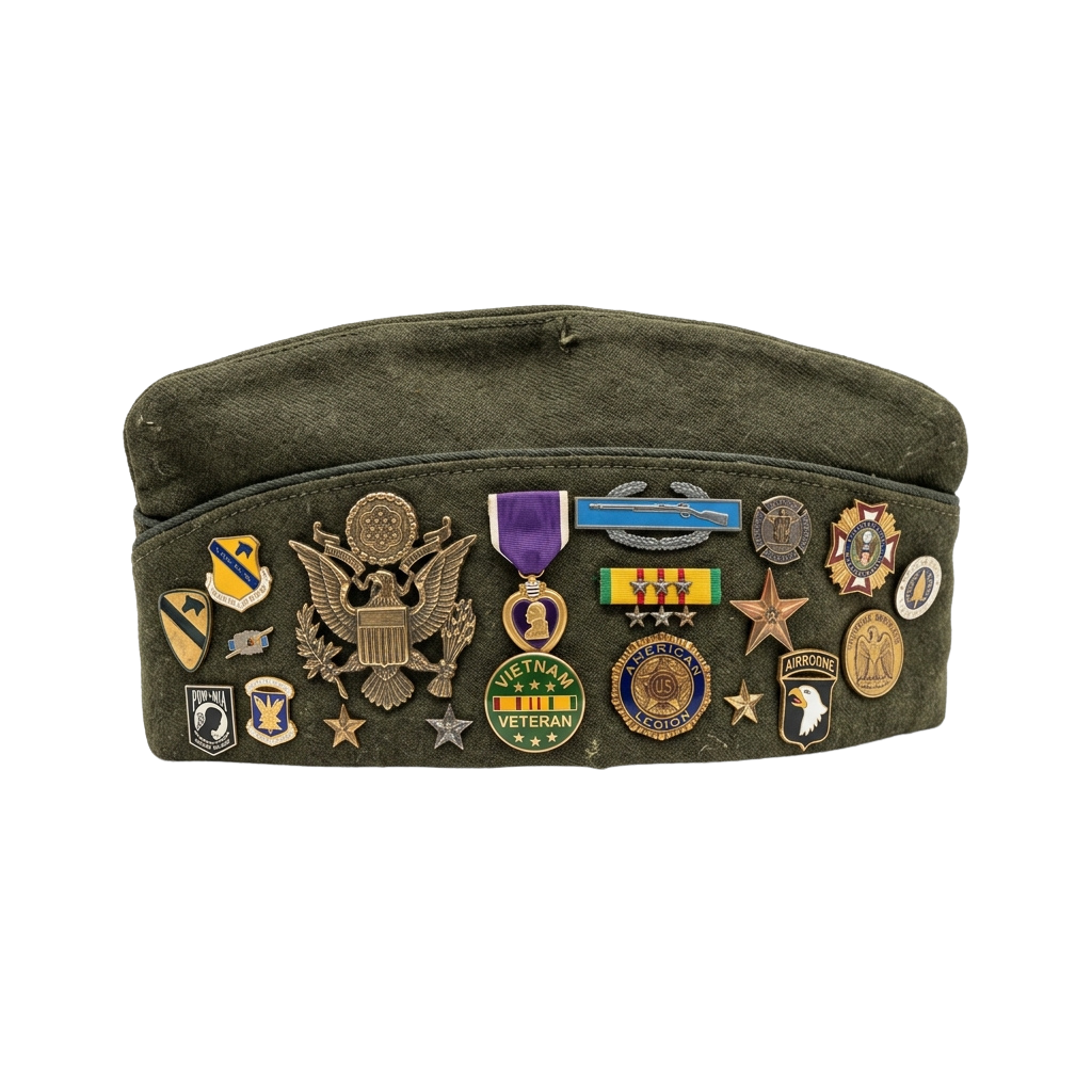Military cap adorned with various medals, badges, and service ribbons on a dark background