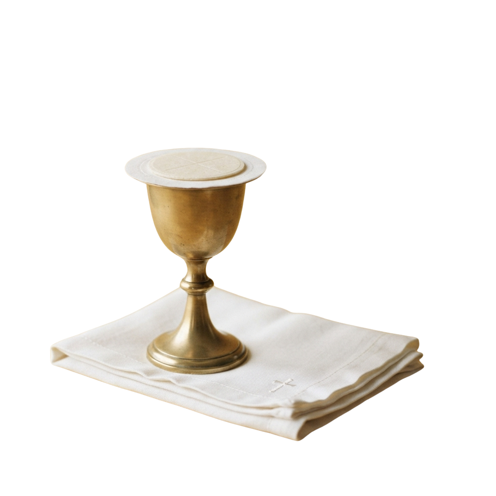 A golden chalice with a rounded cup and stem placed on a white cloth with a cross symbol.