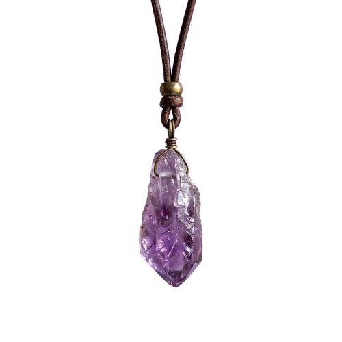 A purple amethyst crystal pendant hanging from a cord necklace against a black background