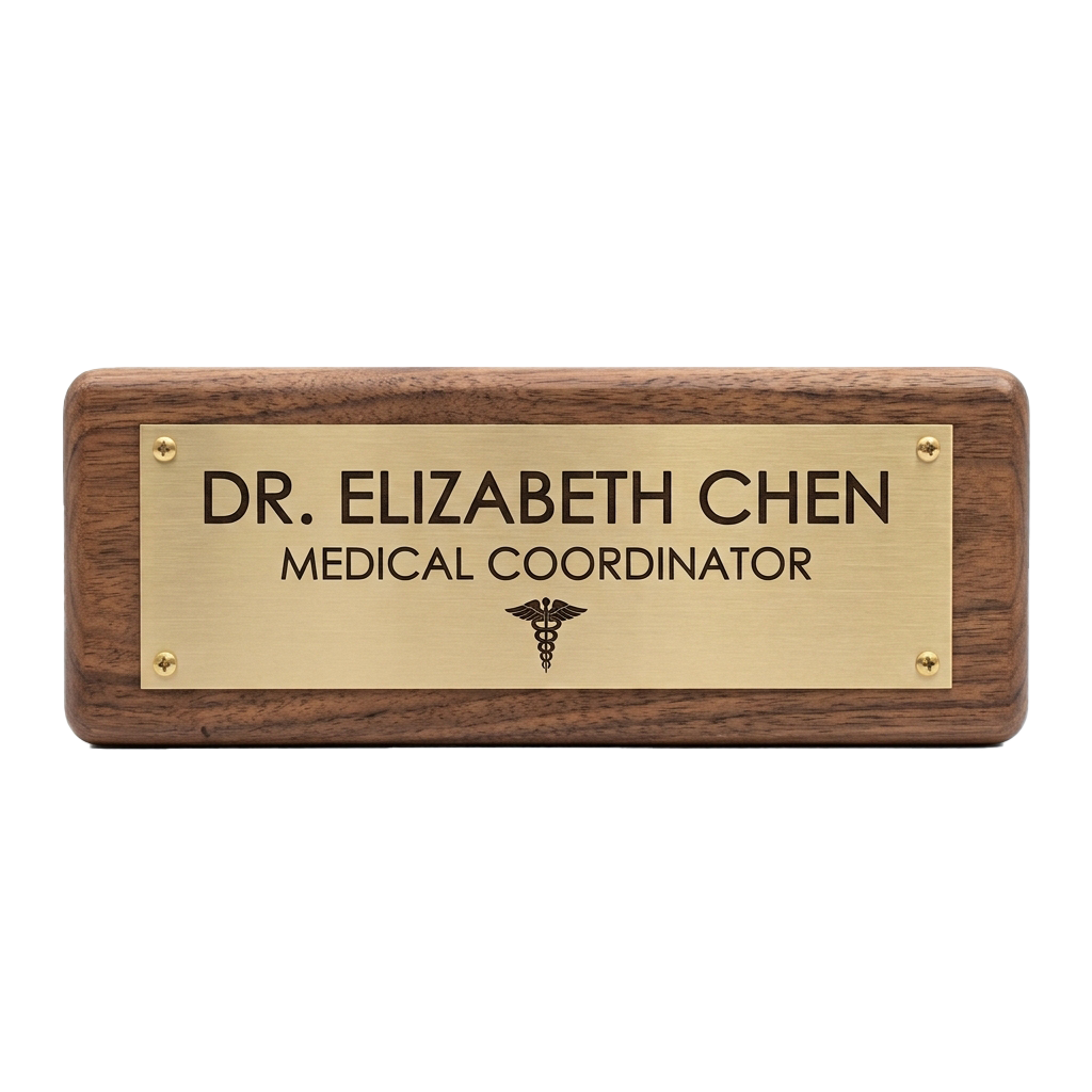 Wooden plaque with gold nameplate reading Medical Coordinator and a Rod of Asclepius symbol