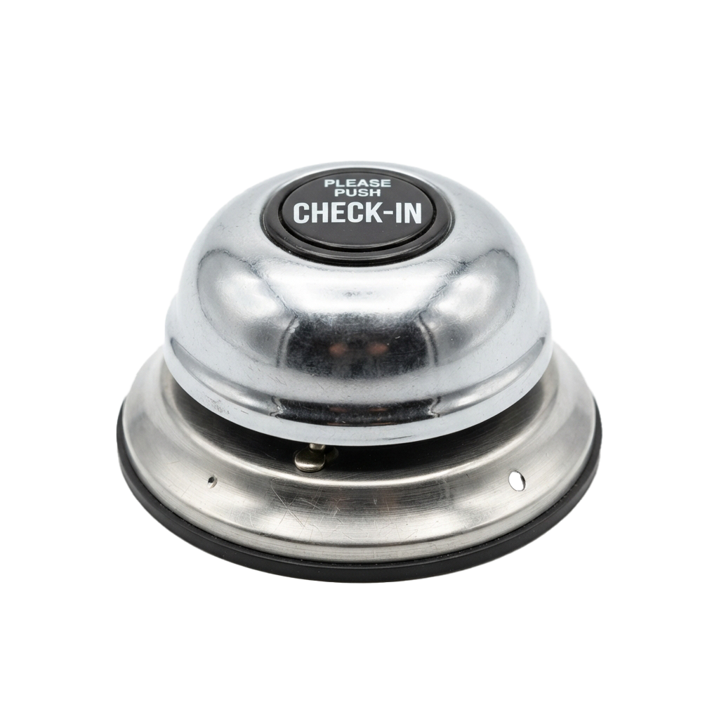 Shiny metallic push button dome labeled Please Push Check-In