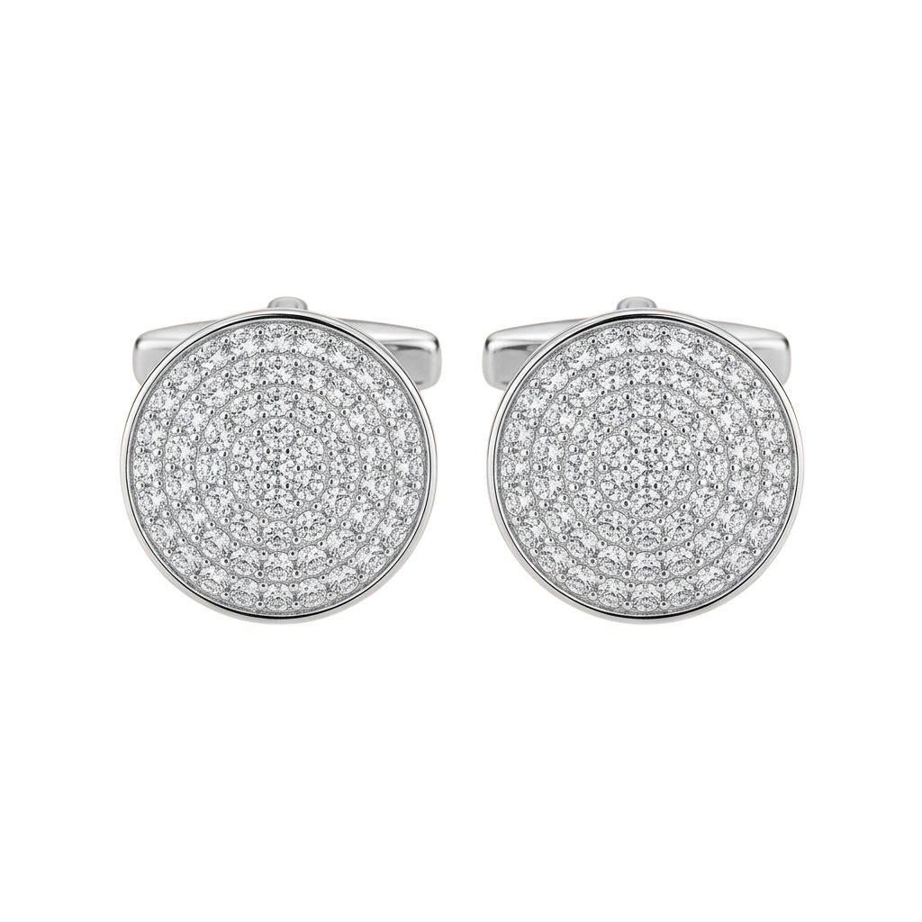 Two round stud earrings with intricate diamond patterns in a silver setting