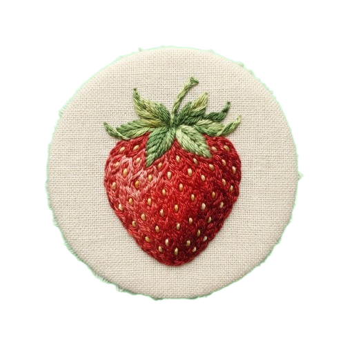 A detailed embroidered strawberry on a light fabric background with green leaves and white stitching on seeds