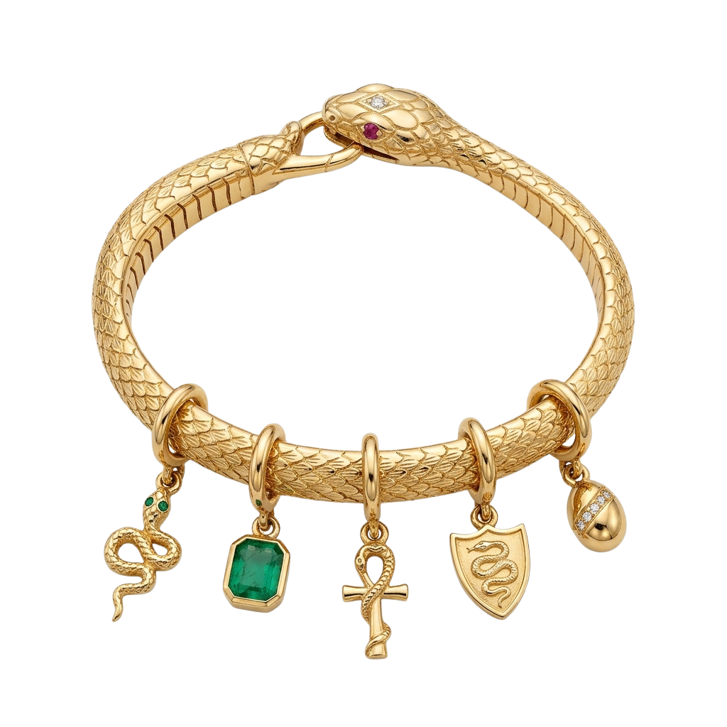 Gold bracelet featuring a snake design with dangling charms including an emerald gem, ankh, and snake symbols
