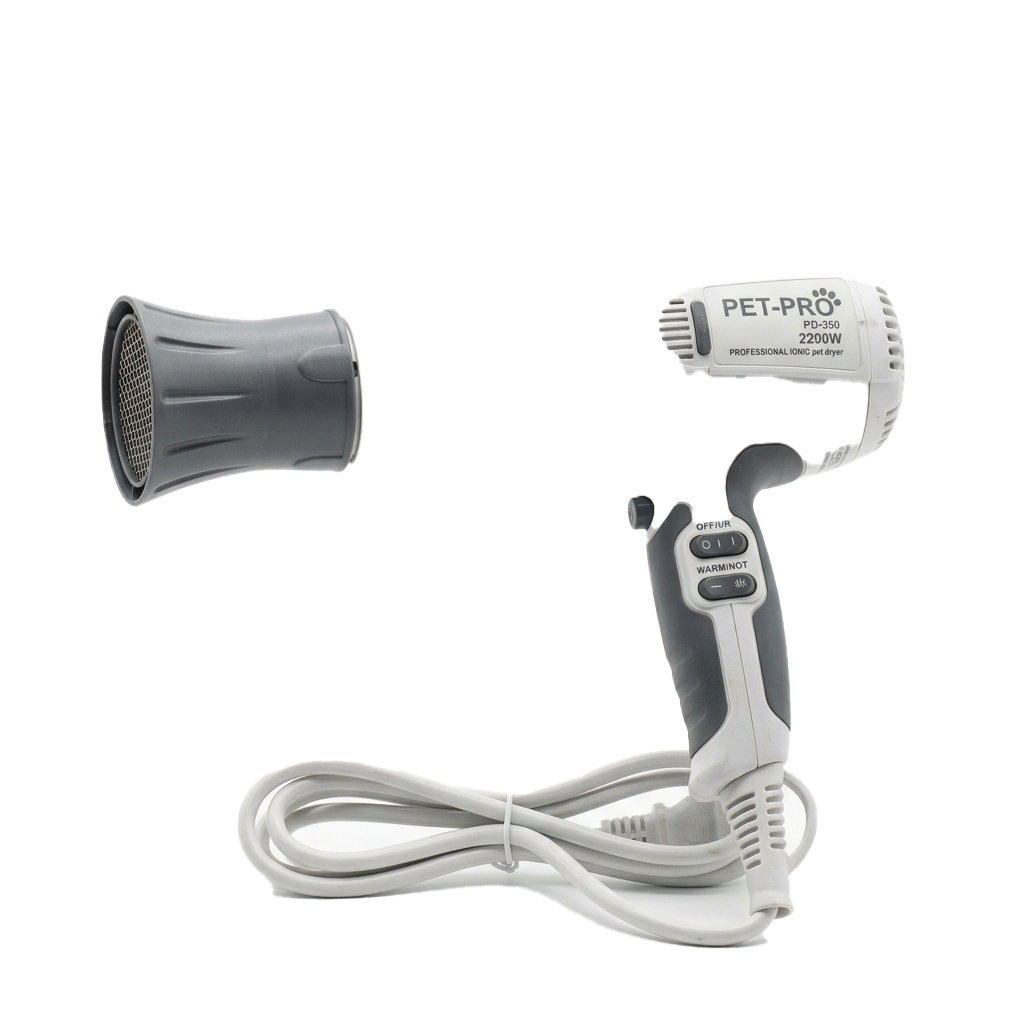A professional grooming tool set including a corded clipper and a slicker brush attachment.