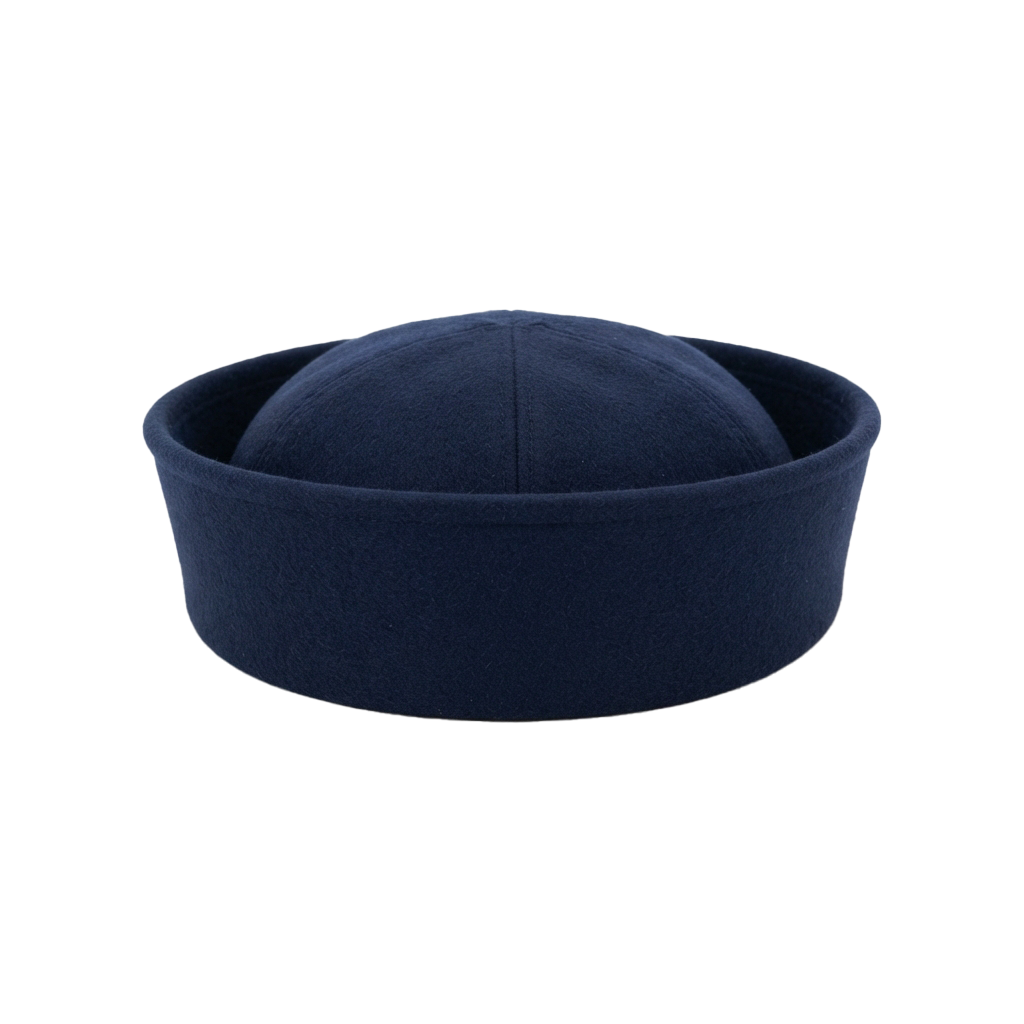 A navy blue felt bowler hat viewed from the front against a dark background