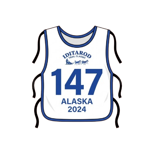 White race bib with blue trim displaying number 147 and Alaska 2024 for Iditarod Trail Classic