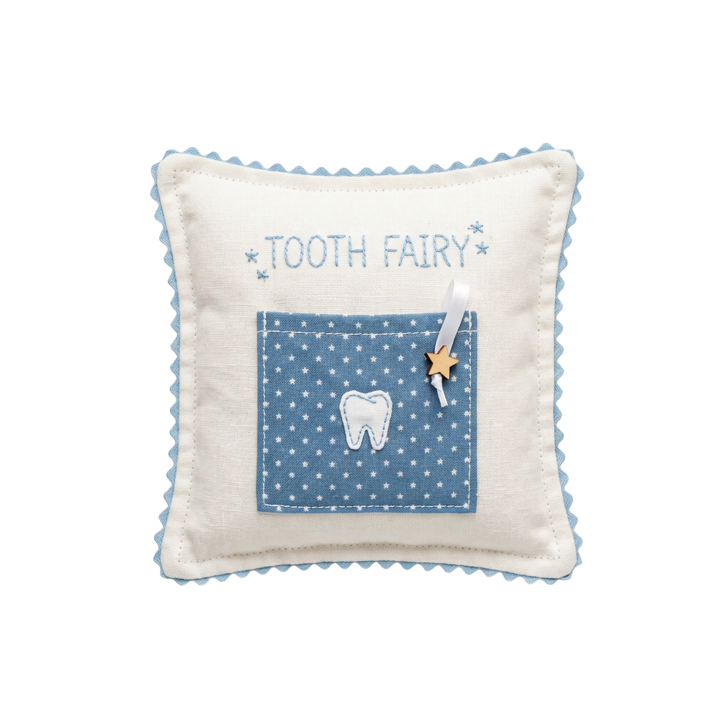 Cute tooth fairy pillow featuring a tooth and star on blue polka dot fabric with scalloped edges