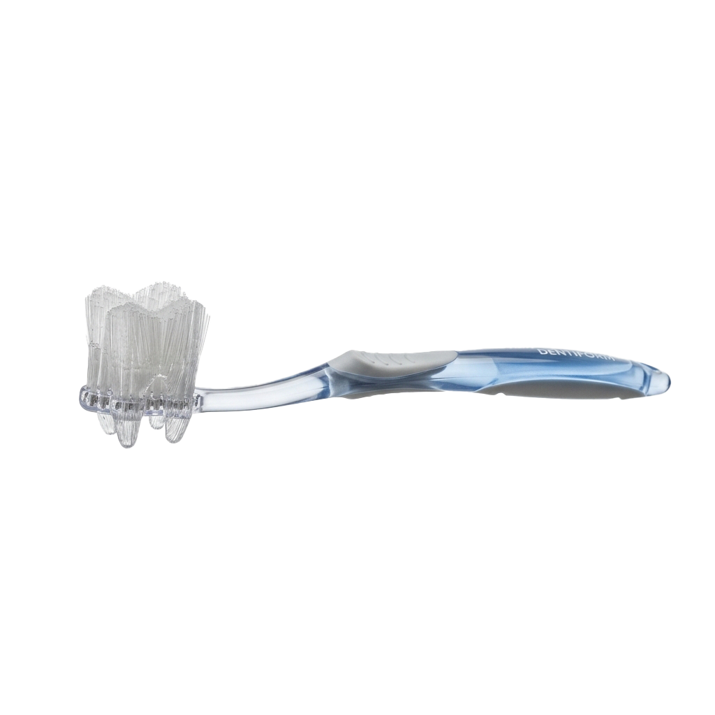Close-up of a white electric toothbrush head with bristles and a blue handle attachment