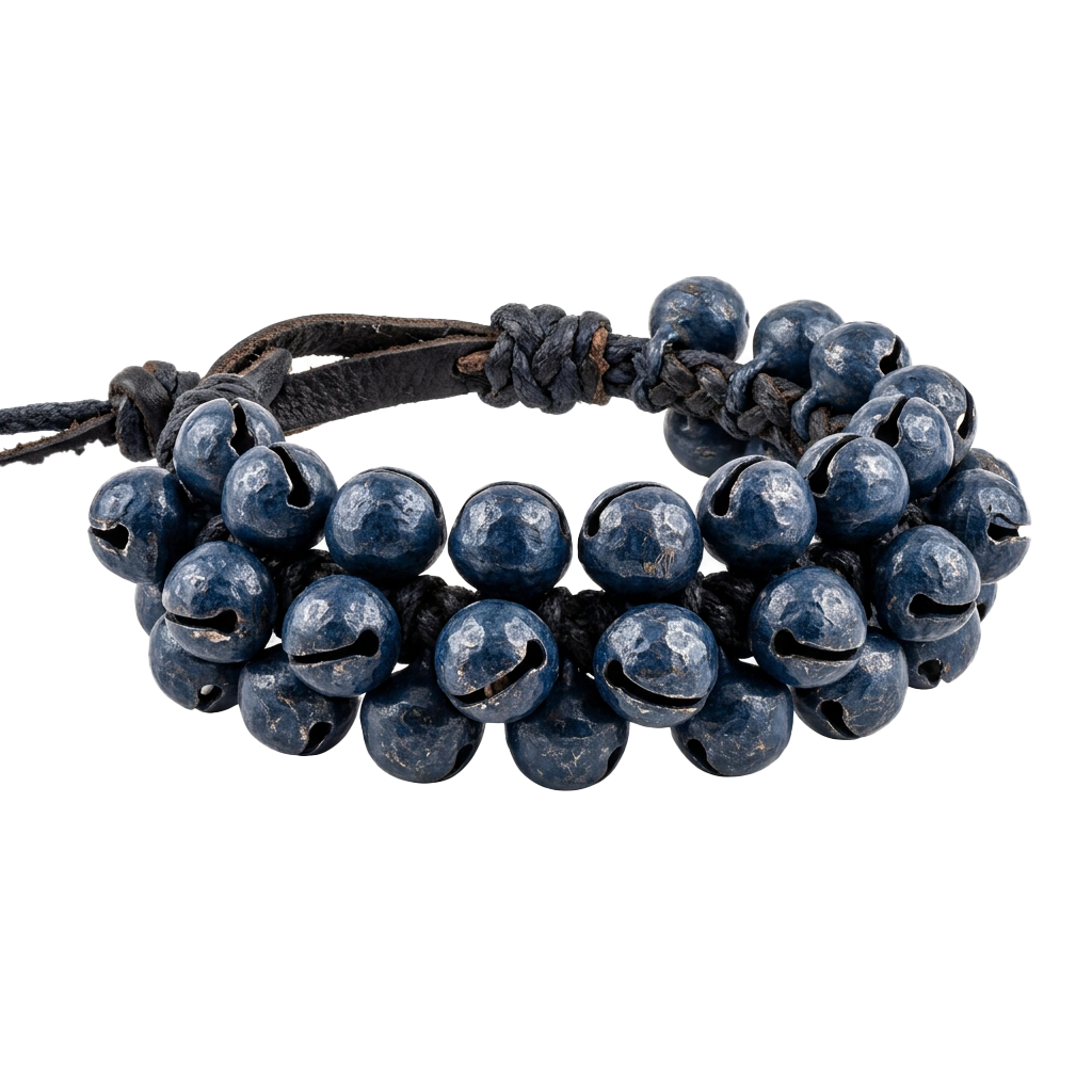 A handcrafted bracelet featuring round blue beads on a dark braided cord.