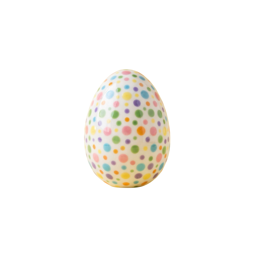 A white egg covered with multicolored polka dots against a black background
