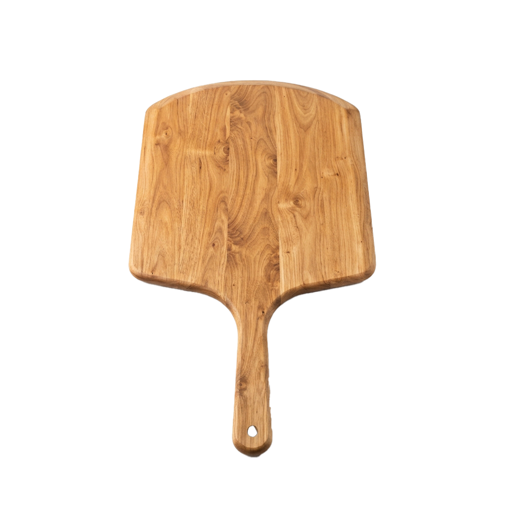 A light brown wooden spatula with a flat, wide blade and a handle hole for hanging