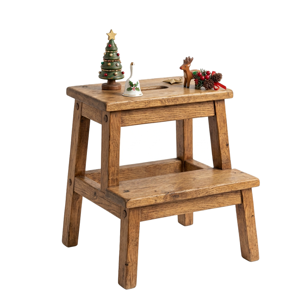 A wooden step stool with holiday-themed decorations including a small Christmas tree, pine cones, and a reindeer figurine on top