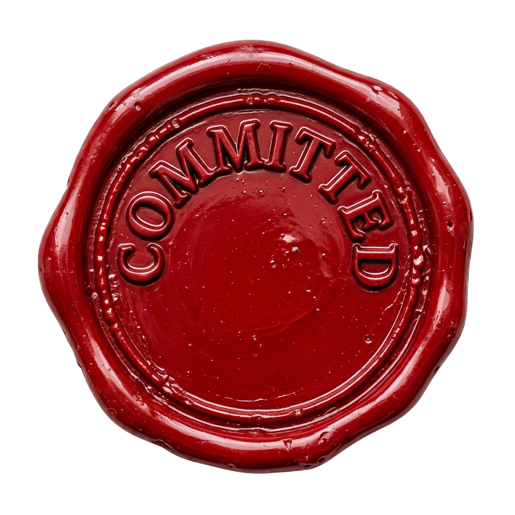 Red circular wax seal with the word committed embossed in uppercase letters