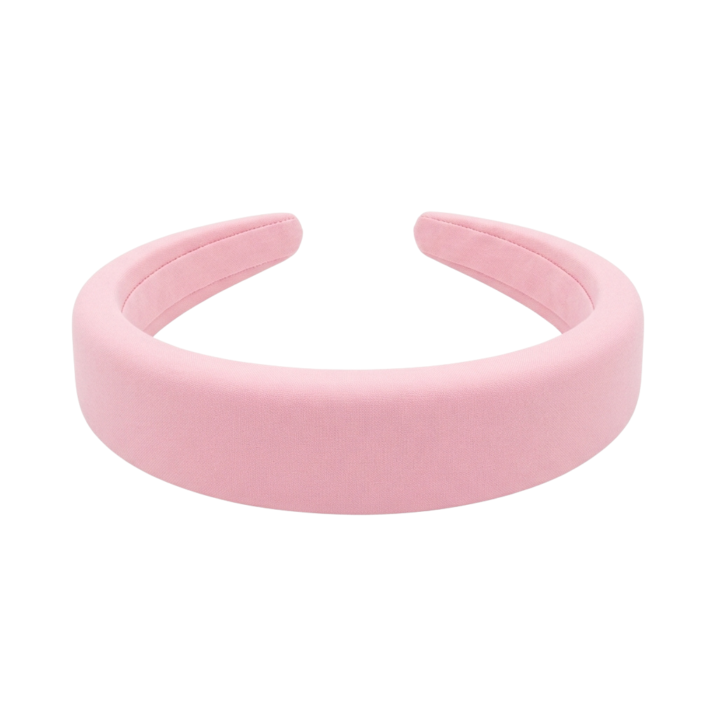 A light pink fabric headband with padded edges and no decorations