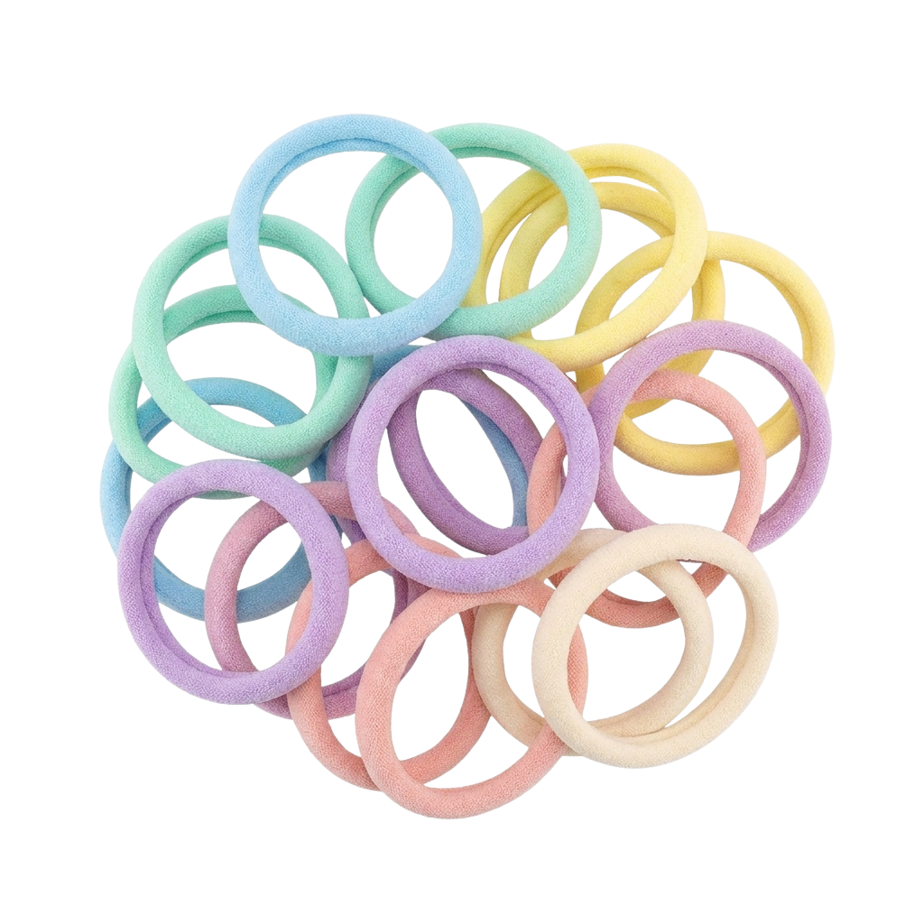 A cluster of multicolored resistance bands in pastel shades stacked together