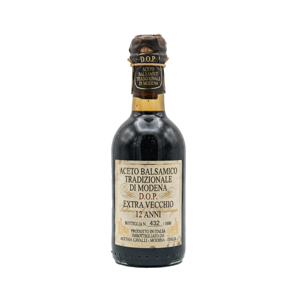 Dark bottle of aged traditional balsamic vinegar labeled Extra Vecchio 12 anni with DOP certification
