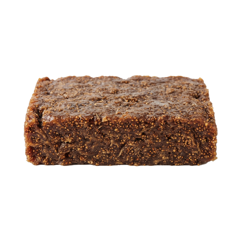 A rectangular energy bar covered in chocolate and topped with seeds and nuts