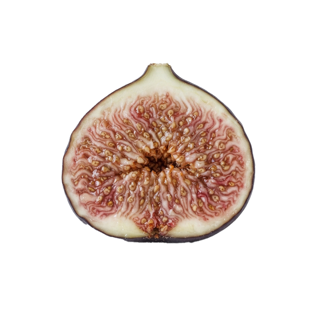 A close-up image of a halved fresh fig revealing its inner seeds and pinkish flesh