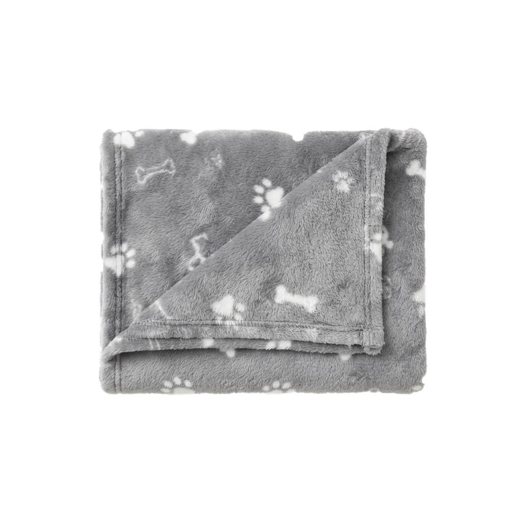 A folded grey fleece blanket featuring a pattern of white dog paw prints and bones
